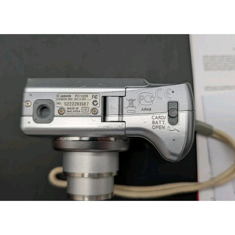 Canon PowerShot A560 7.1 MP Digital Camera With 4x Optical Zoom Silver No Card